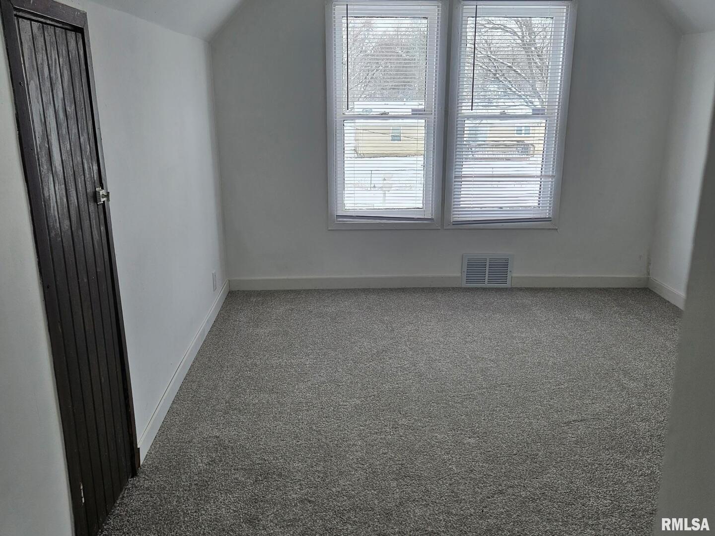 201 East May Street Joy, IL 61260 - Photo 18 of 18 an empty room with a window