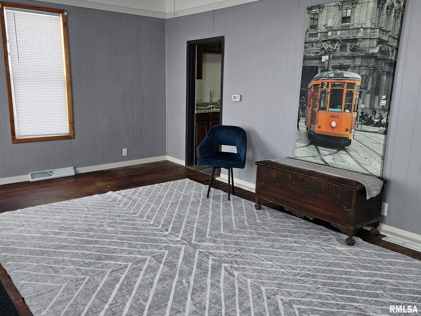 201 East May Street Joy, IL 61260 - Photo 7 of 18 a living room with furniture and wooden floor