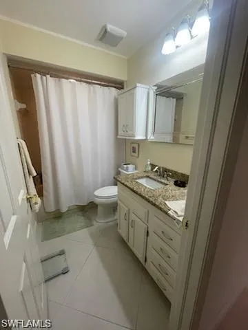 a bedroom with bed and window