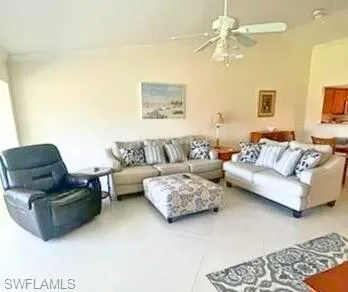 a spacious kitchen with stainless steel appliances granite countertop a sink stove and refrigerator