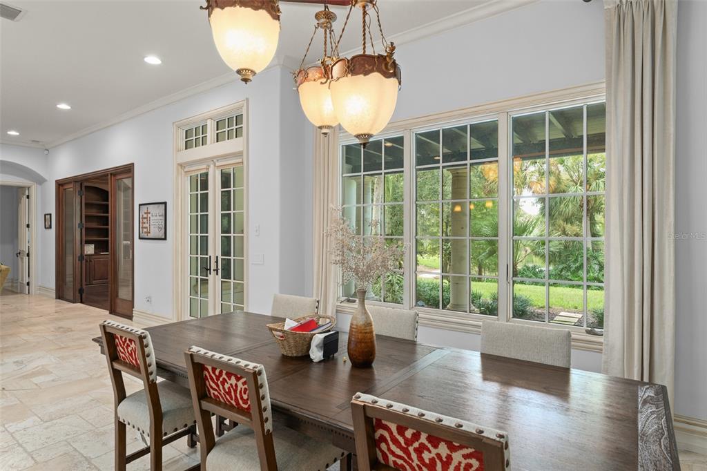 4812 Alexandra Garden Court Windermere, FL 34786 - Photo 14 of 65 a living room with furniture and a large window