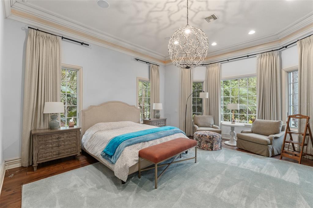 4812 Alexandra Garden Court Windermere, FL 34786 - Photo 18 of 65 a bedroom with a bed couch and windows