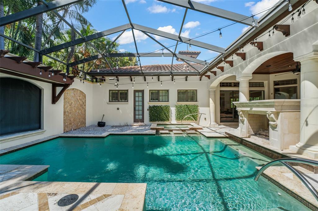 4812 Alexandra Garden Court Windermere, FL 34786 - Photo 40 of 65 a view of a house with backyard sitting area and garden