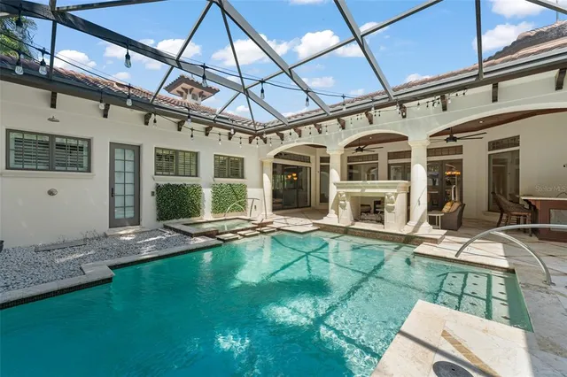 a view of a field of grass and trees