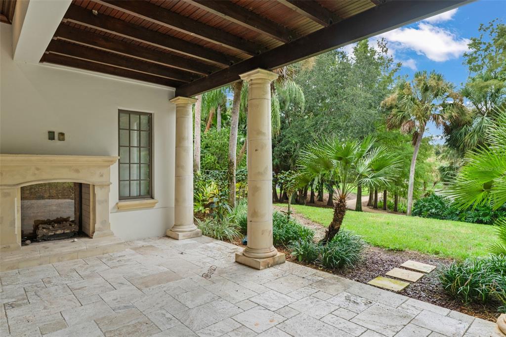 4812 Alexandra Garden Court Windermere, FL 34786 - Photo 55 of 65 a front view of a house with garden