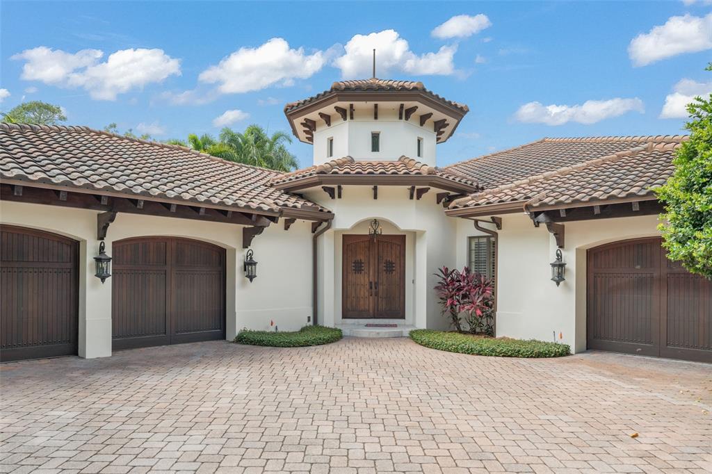 4812 Alexandra Garden Court Windermere, FL 34786 - Photo 64 of 65 a view of a house with a roof deck