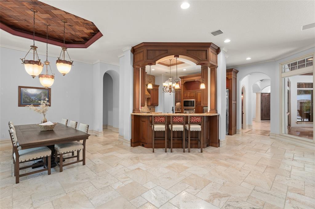 4812 Alexandra Garden Court Windermere, FL 34786 - Photo 8 of 65 a lobby with furniture and dining table