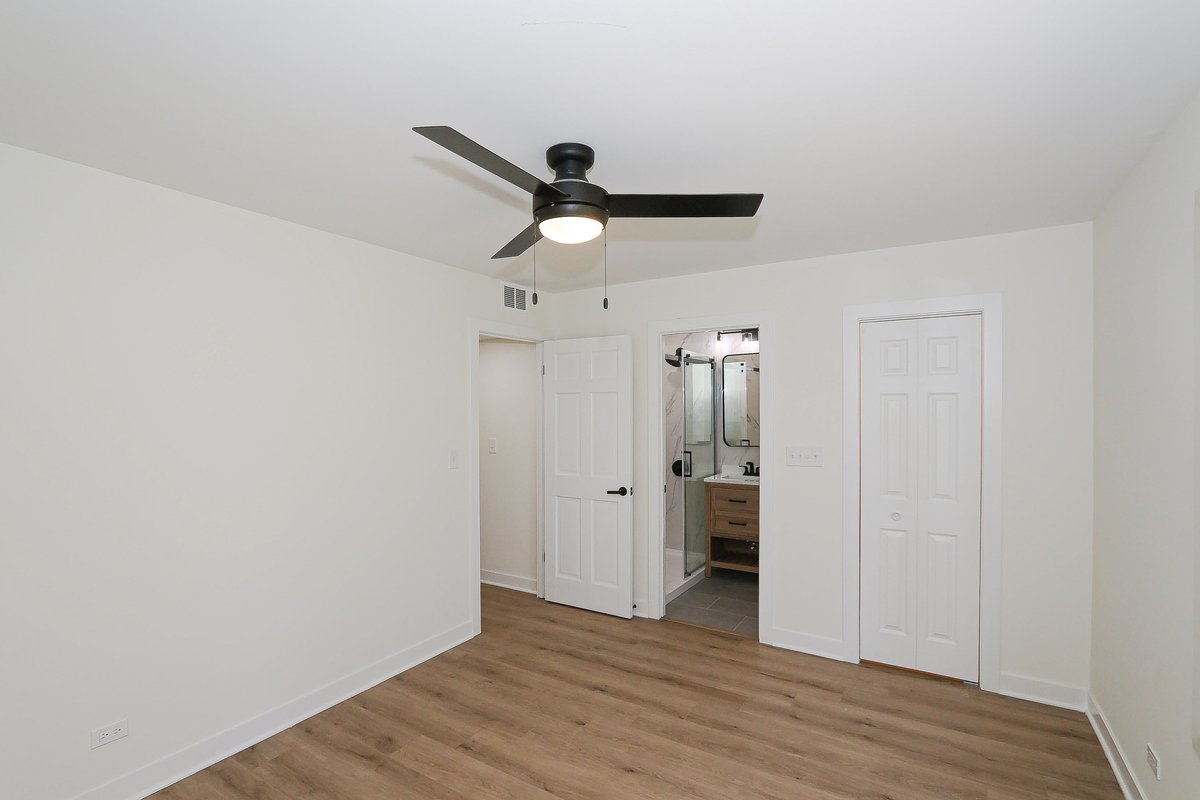 464 Winterwood Drive Roselle, IL 60172 - Photo 19 of 39 a view of empty room with wooden floor