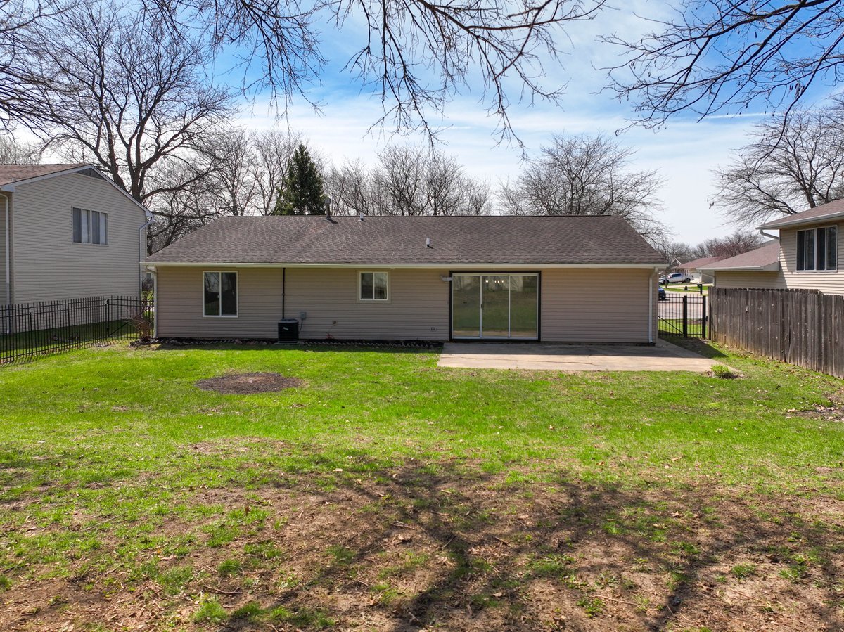 464 Winterwood Drive Roselle, IL 60172 - Photo 25 of 39 a front view of house with yard and green space