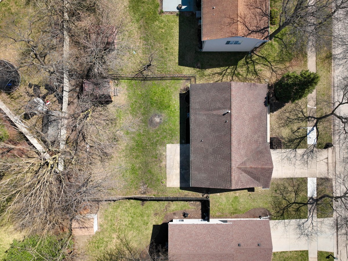 464 Winterwood Drive Roselle, IL 60172 - Photo 27 of 39 a aerial view of a house with a yard and large trees