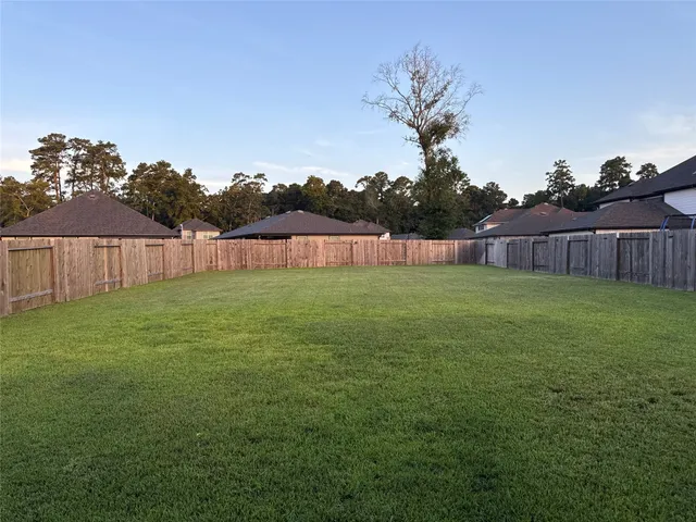 a view of a backyard with a garden