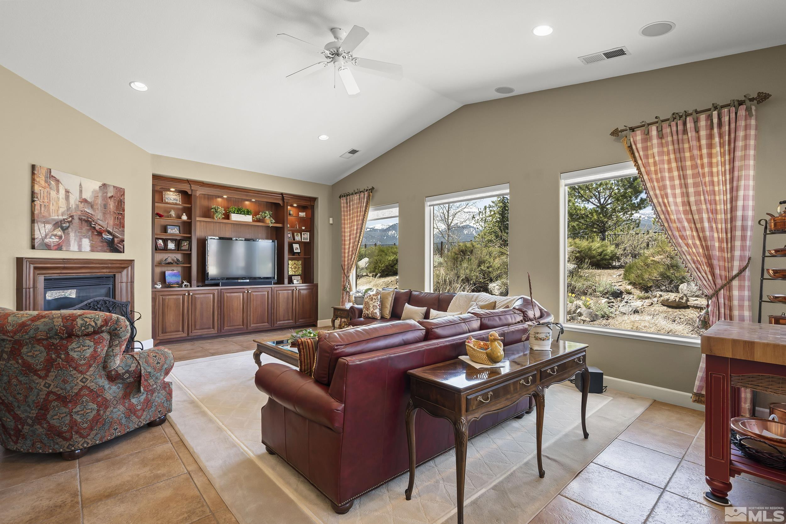 15300 Redmond Loop Reno, NV 89511 - Photo 11 of 35 a living room with furniture and a large window