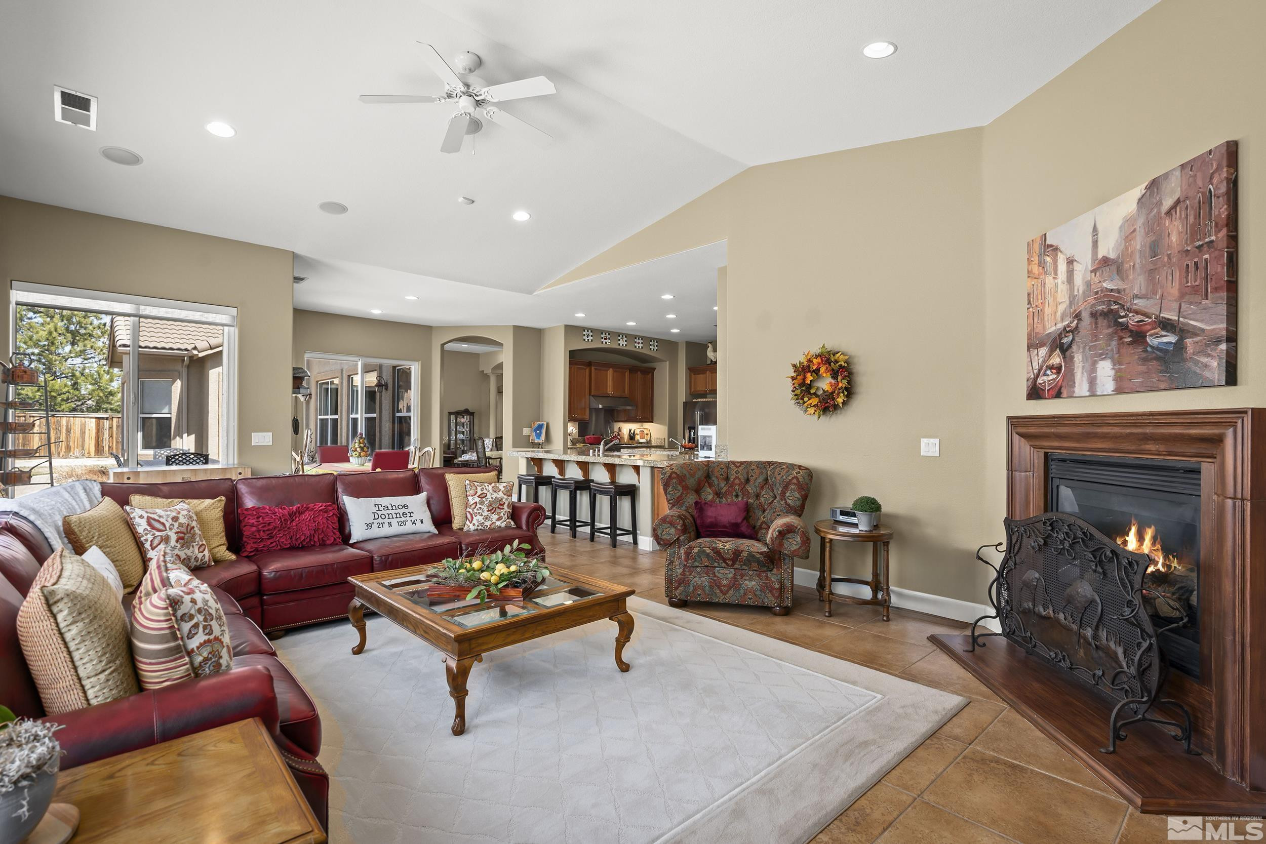 15300 Redmond Loop Reno, NV 89511 - Photo 13 of 35 a living room with furniture and a fireplace