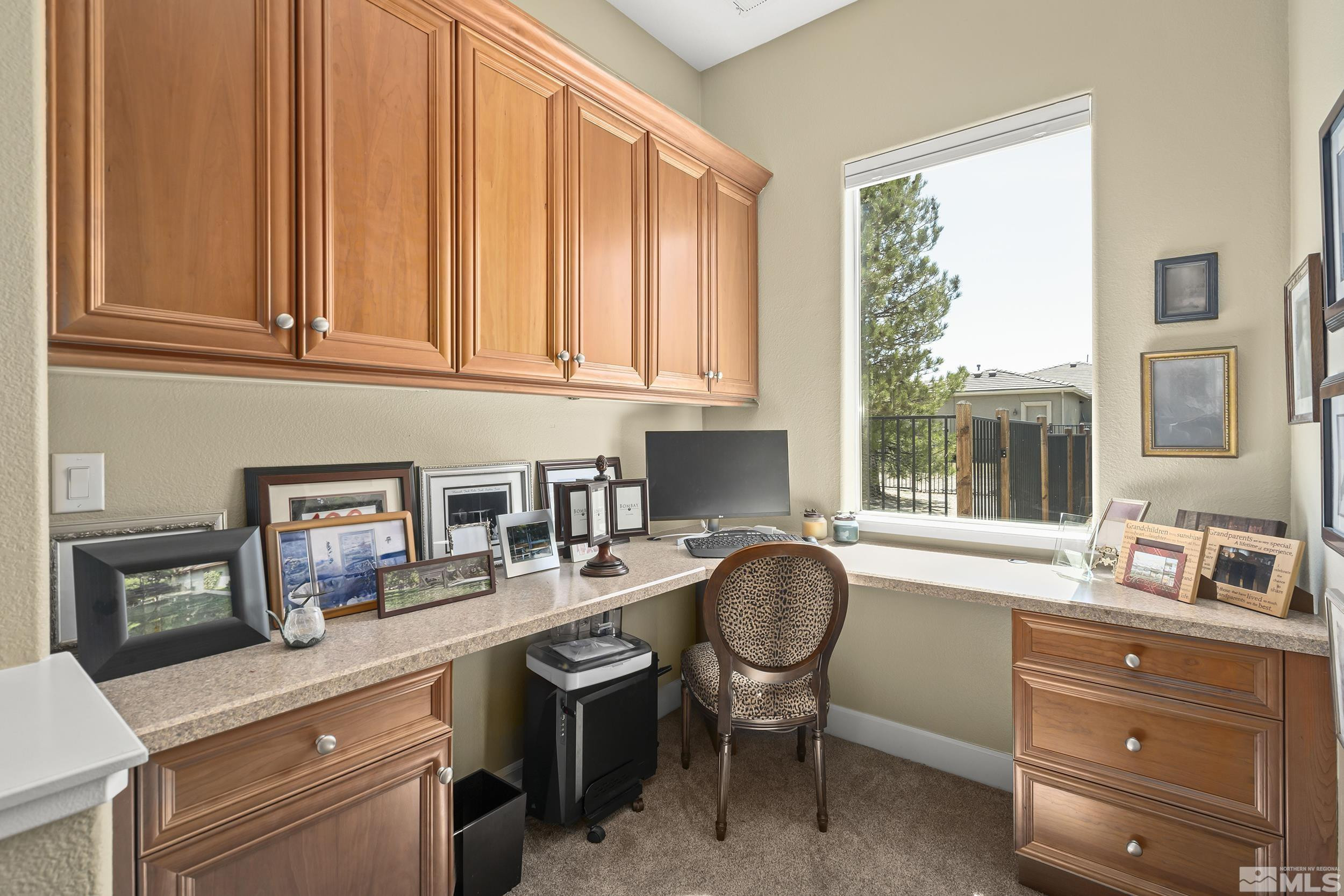 15300 Redmond Loop Reno, NV 89511 - Photo 24 of 35 a kitchen with a sink cabinets and window