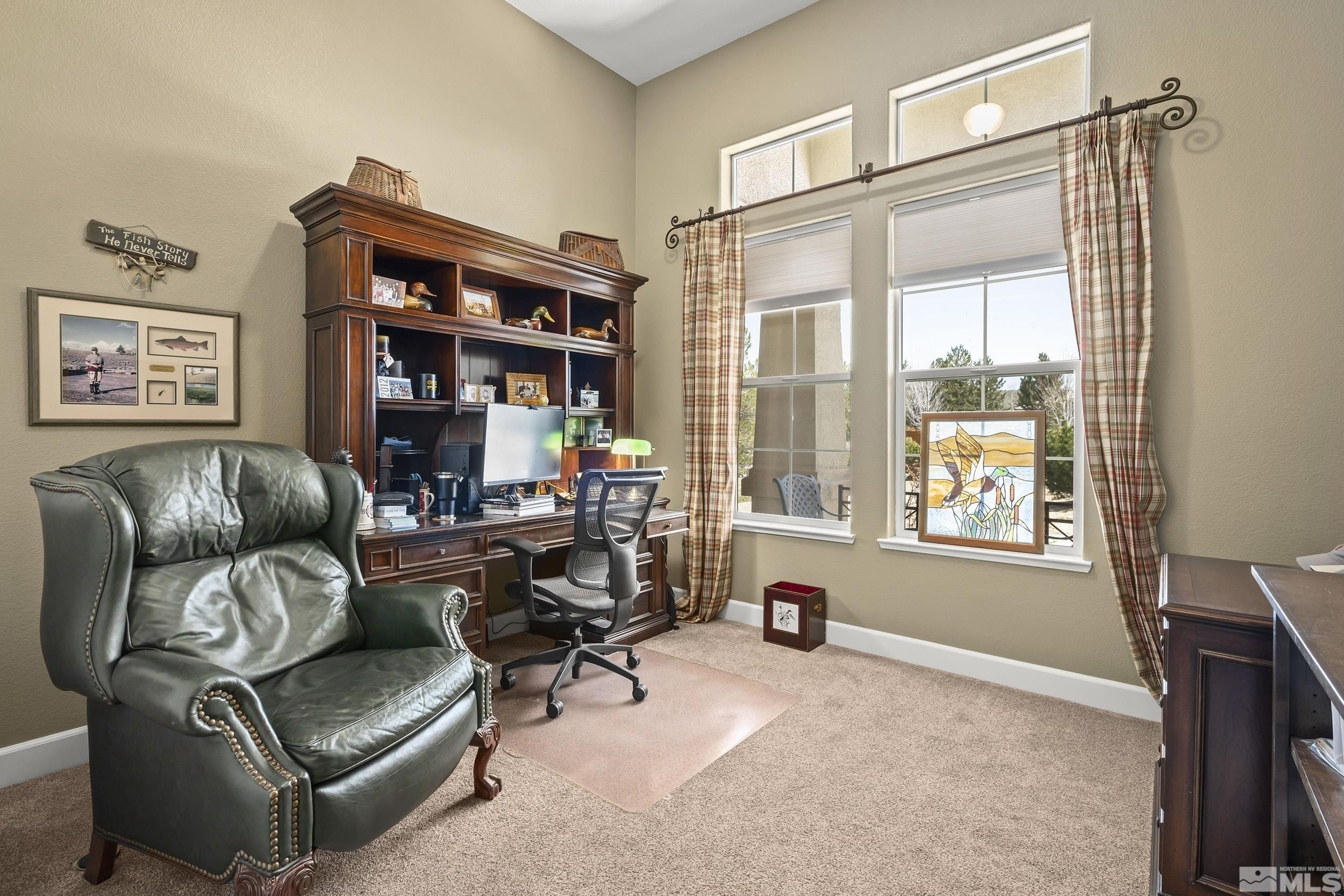 15300 Redmond Loop Reno, NV 89511 - Photo 27 of 35 a living room with furniture and a window