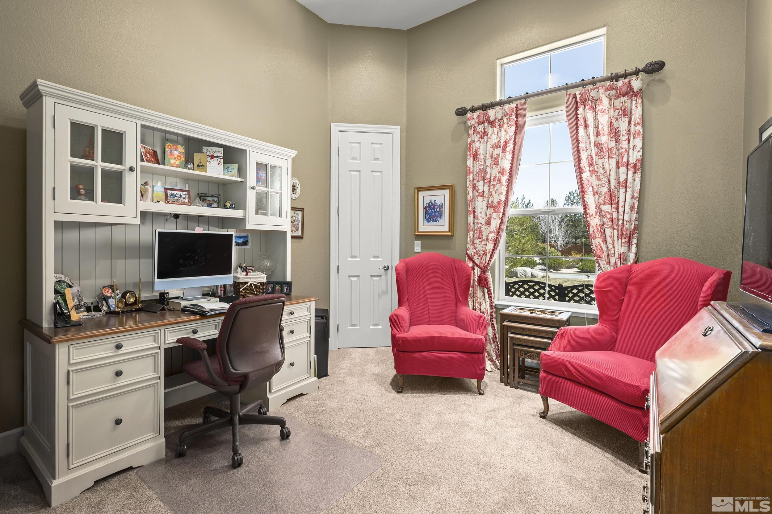 15300 Redmond Loop Reno, NV 89511 - Photo 28 of 35 a view of a livingroom with workspace and a window
