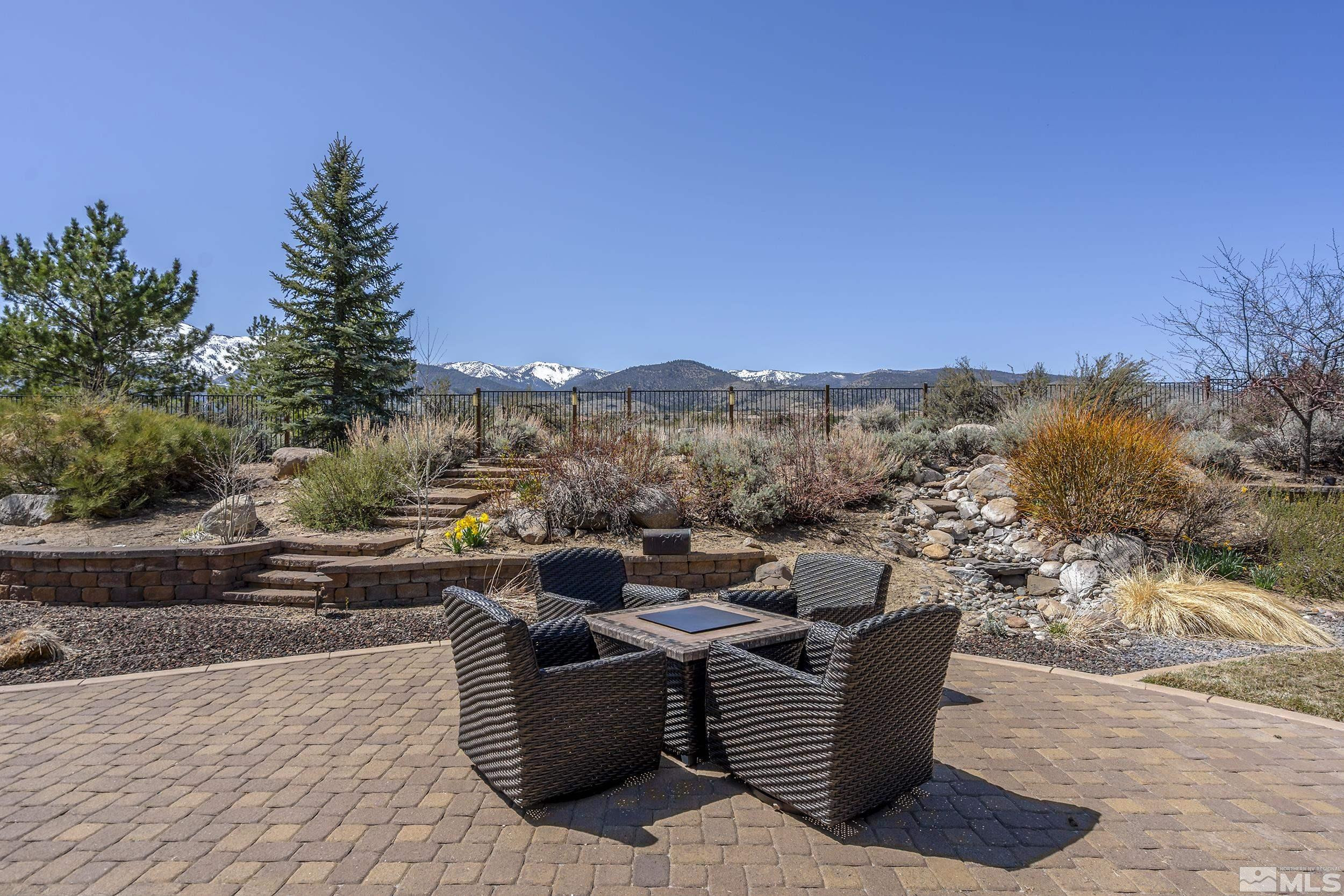 15300 Redmond Loop Reno, NV 89511 - Photo 32 of 35 a view of roof deck with couches and wooden floor