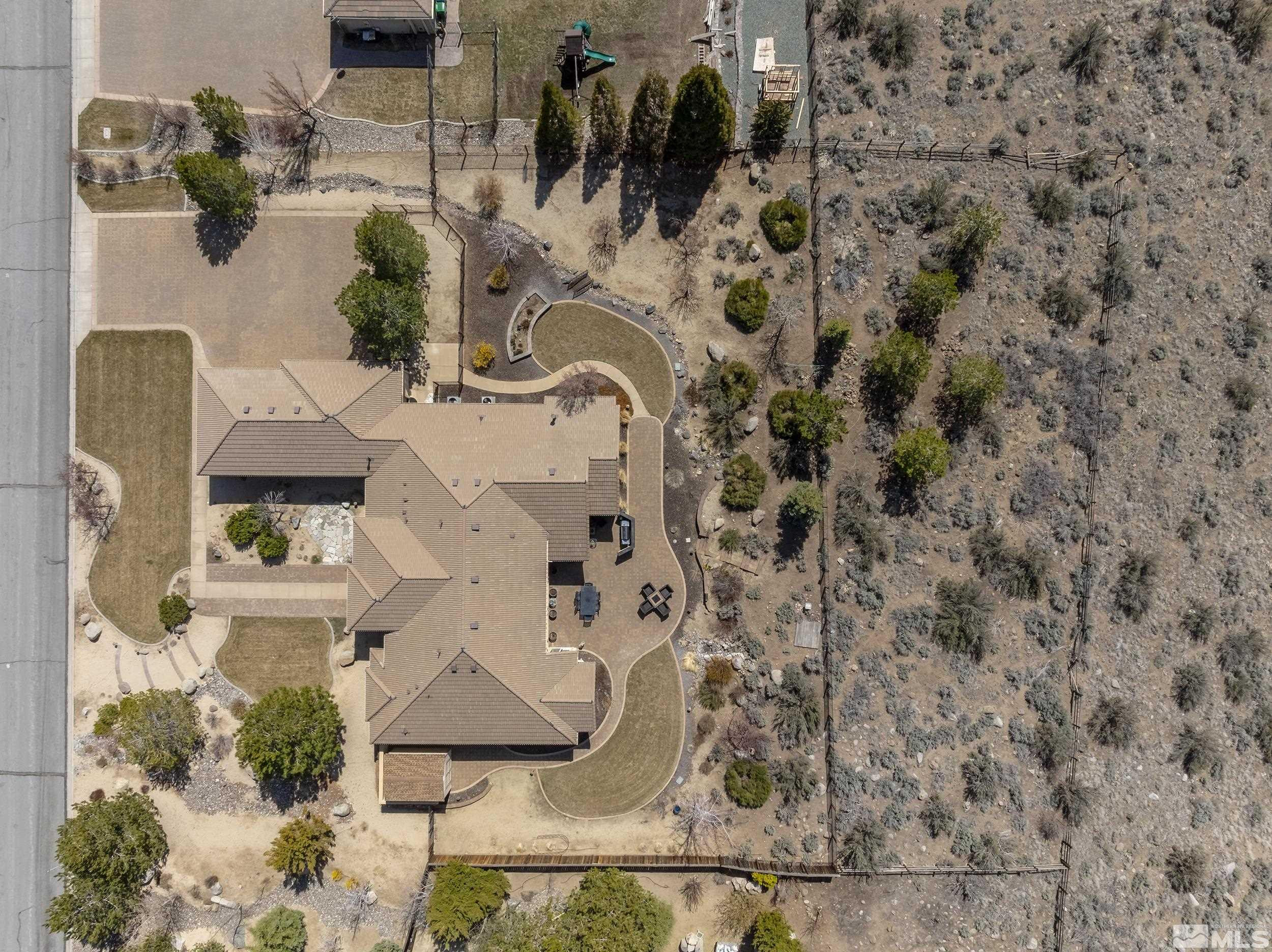15300 Redmond Loop Reno, NV 89511 - Photo 34 of 35 an aerial view of residential houses with outdoor space