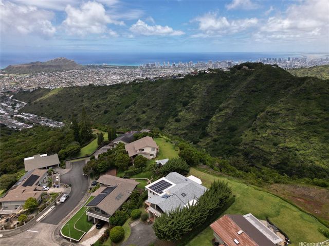 an aerial view of residential house with outdoor space