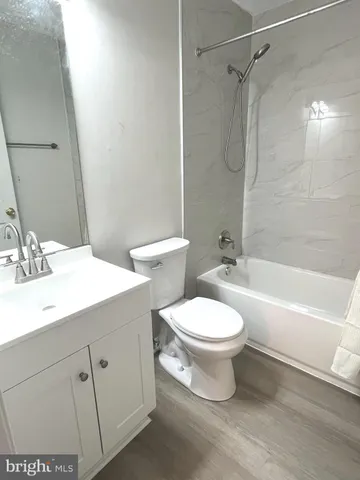 a view of wooden floor and a brick building