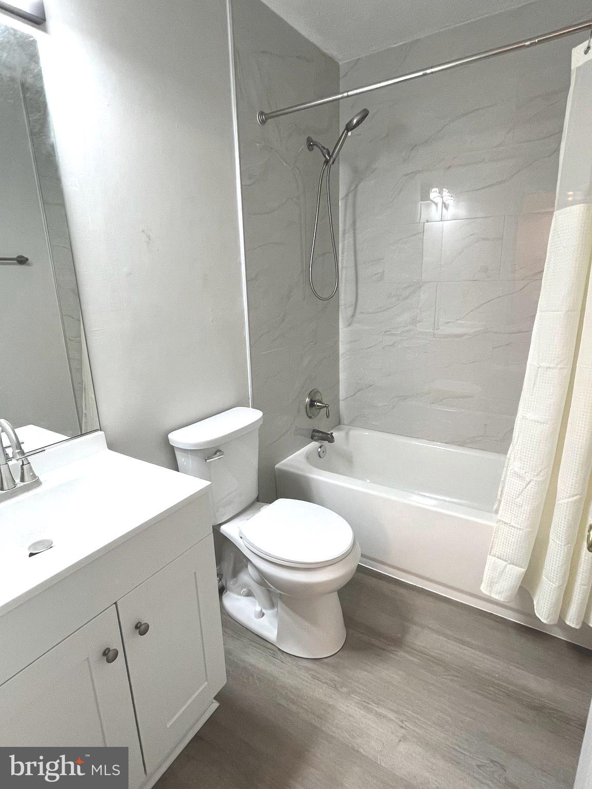 305 Sutton Court Winchester, VA 22601 - Photo 32 of 40 a bathroom with a sink toilet and shower