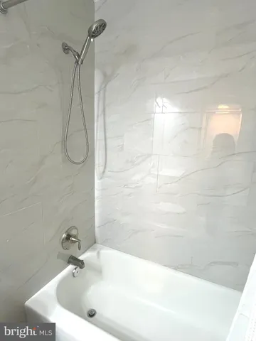 a bathroom with a bathtub