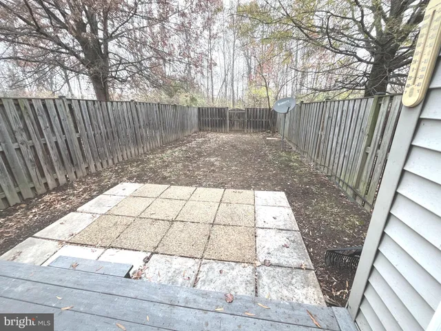 a view of backyard with wooden floor
