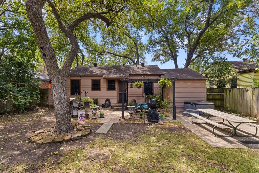 1703 Brandon Street Dallas, TX 75208 - Photo 13 of 16 a front view of a house with patio