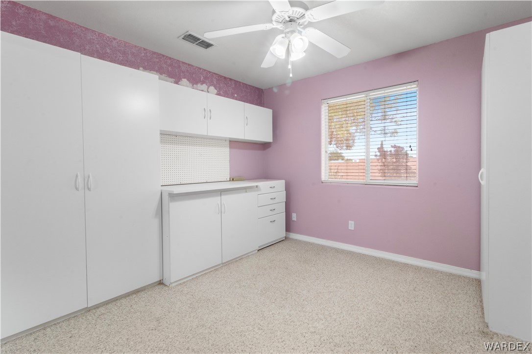 2158 Ranch Road Kingman, AZ 86401 - Photo 17 of 48 a view of an empty room with a window