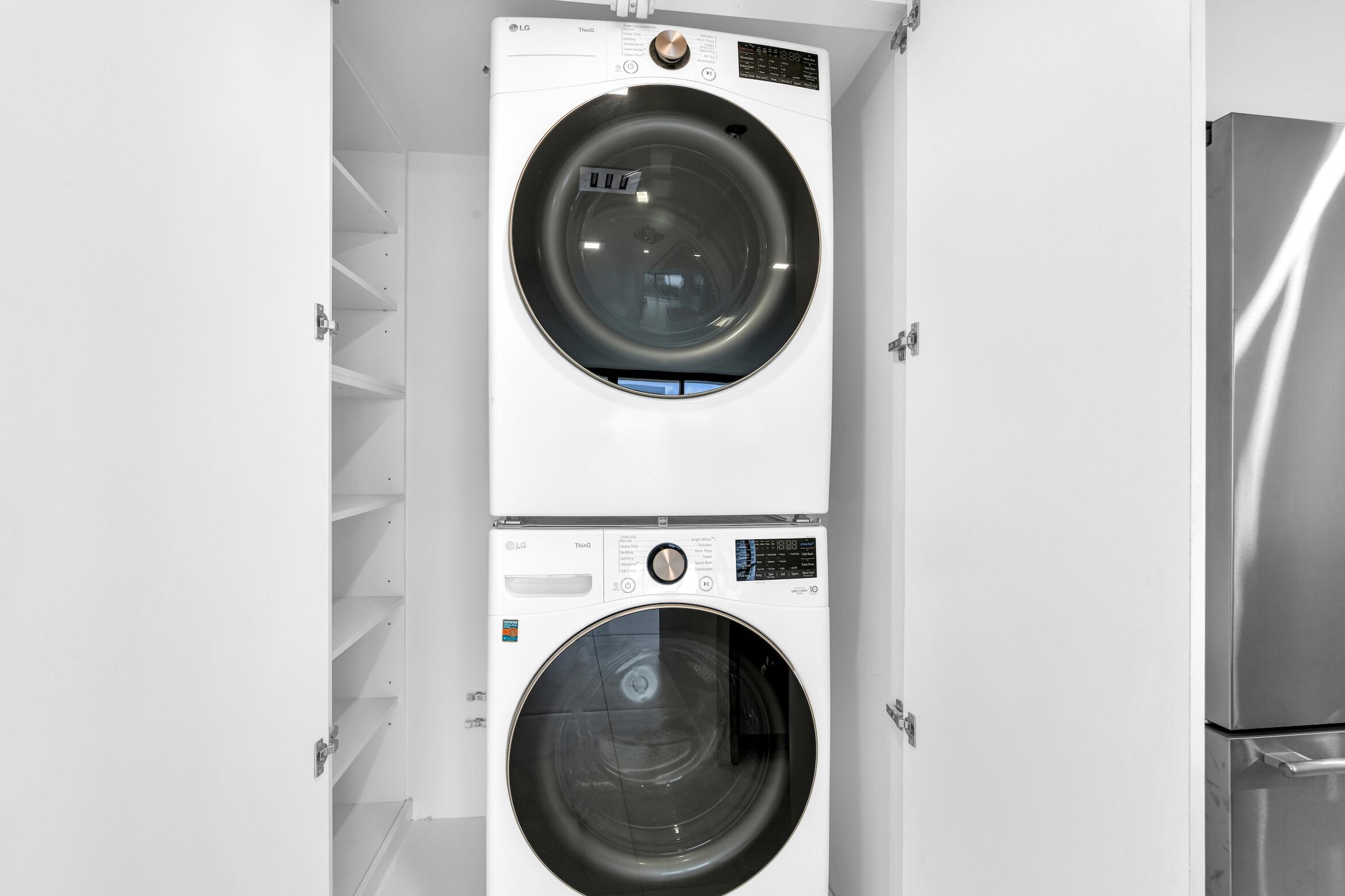2001 North Ocean Boulevard, Unit 502 Boca Raton, FL 33431 - Photo 11 of 67 a utility room with dryer and washer