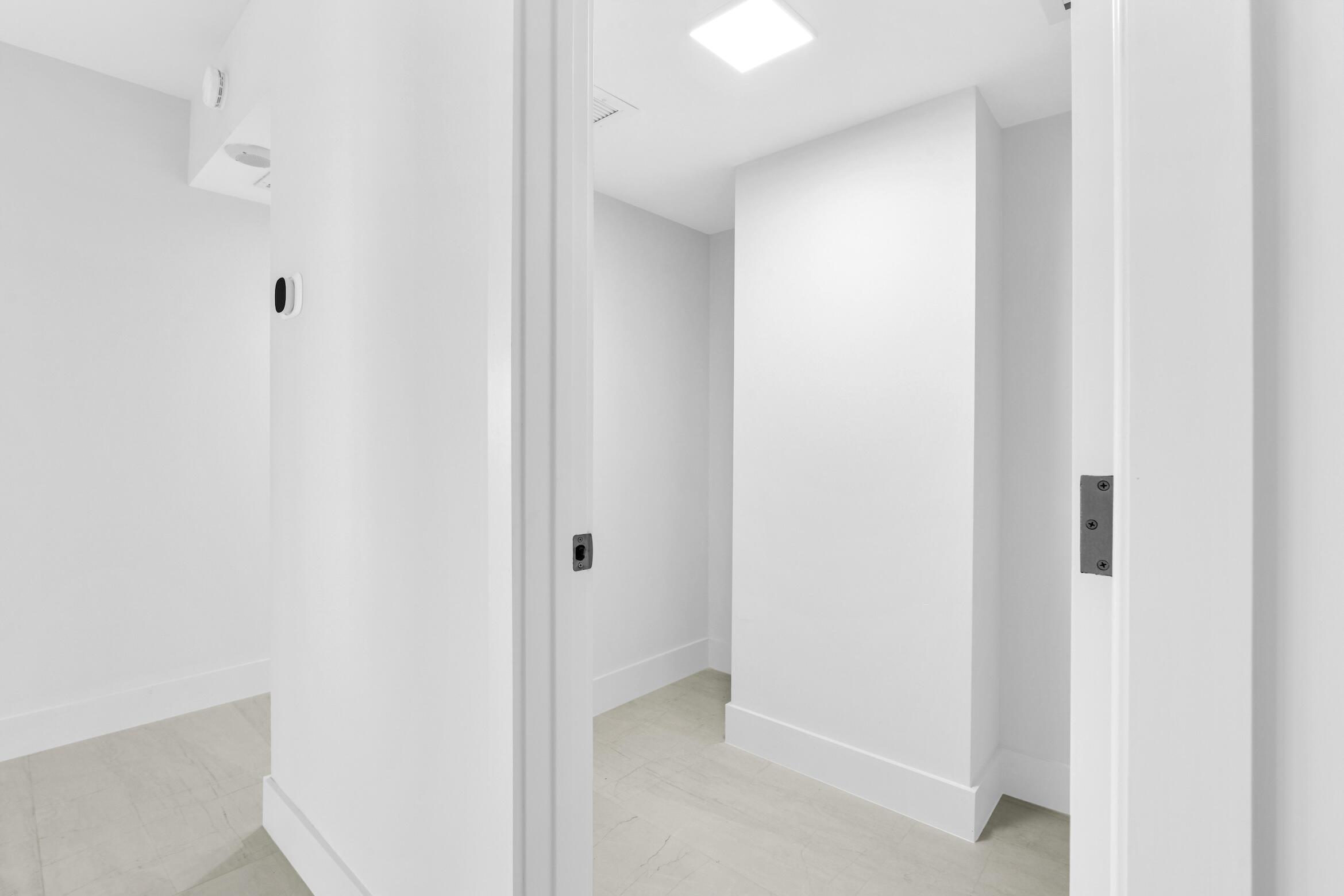 2001 North Ocean Boulevard, Unit 502 Boca Raton, FL 33431 - Photo 23 of 67 a view of a hallway