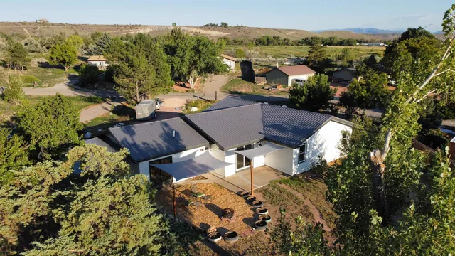 a view of a house with a mountain