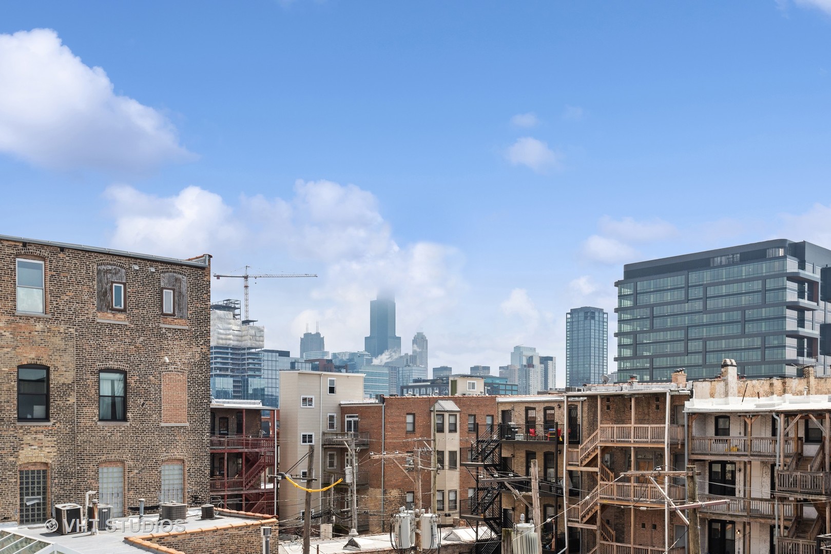 523 North Racine Avenue, Unit 4 Chicago, IL 60642 - Photo 15 of 17 a view of city with tall buildings