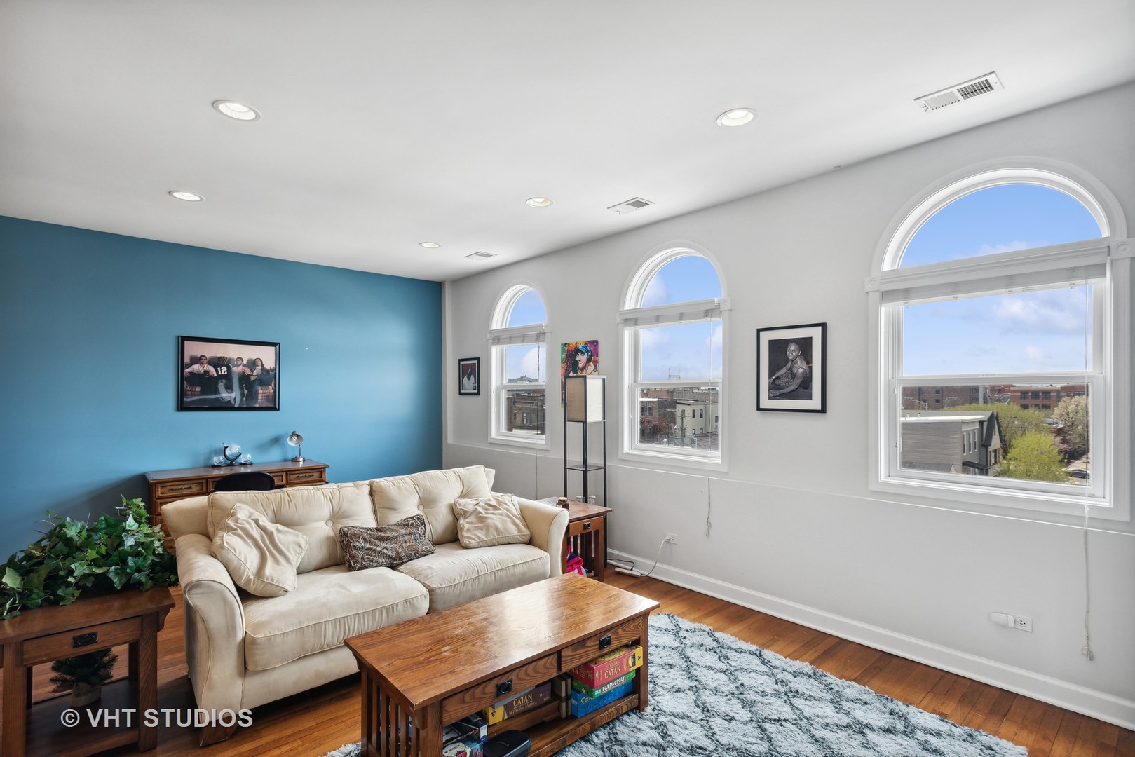523 North Racine Avenue, Unit 4 Chicago, IL 60642 - Photo 4 of 17 a living room with furniture and a window