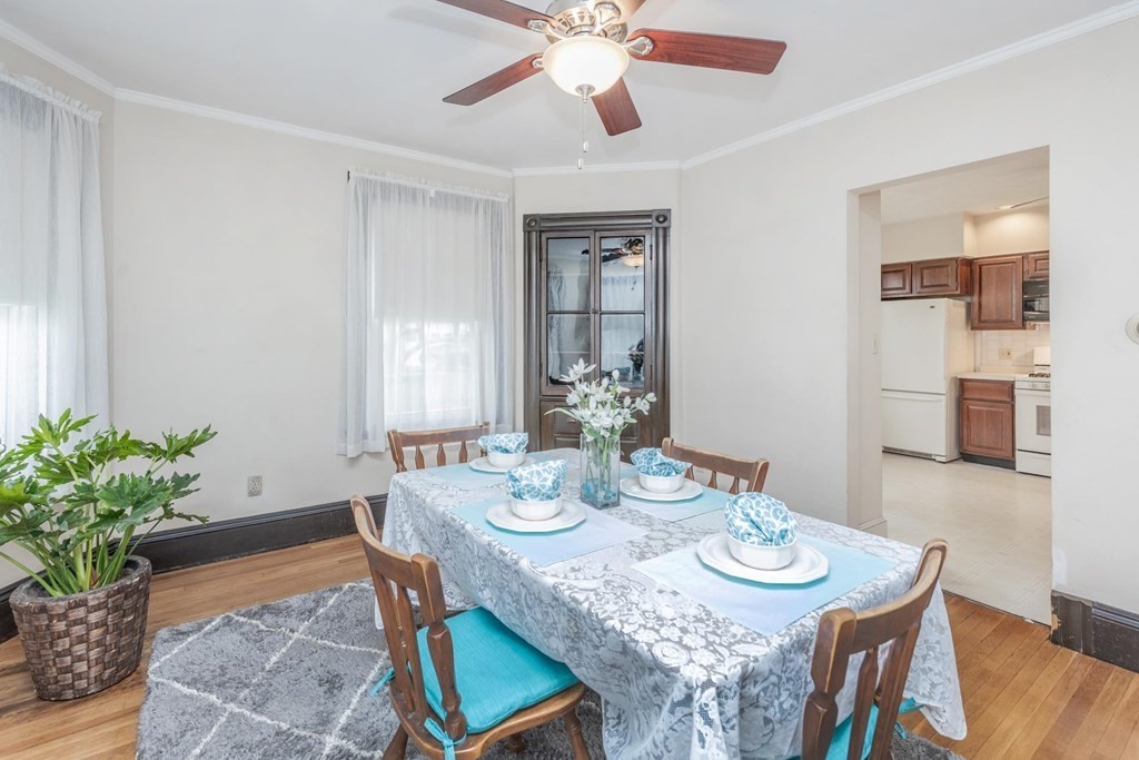 28 Andover Street Peabody, MA 01960 - Photo 12 of 30 a view of a dining room with furniture and wooden floor