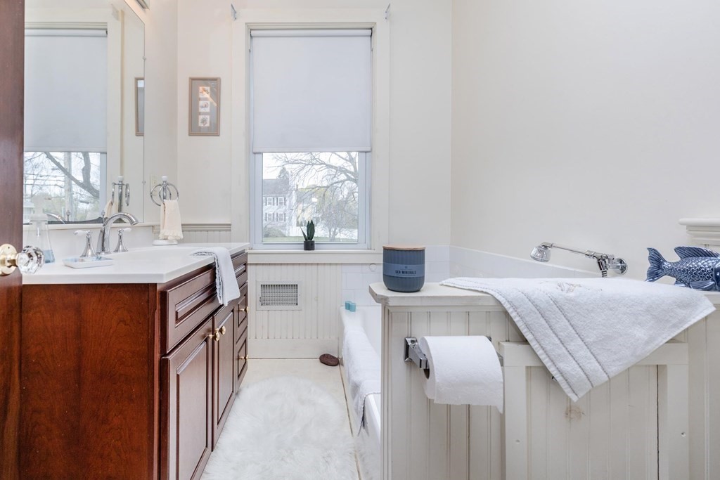 28 Andover Street Peabody, MA 01960 - Photo 24 of 30 a bathroom with a sink and a mirror