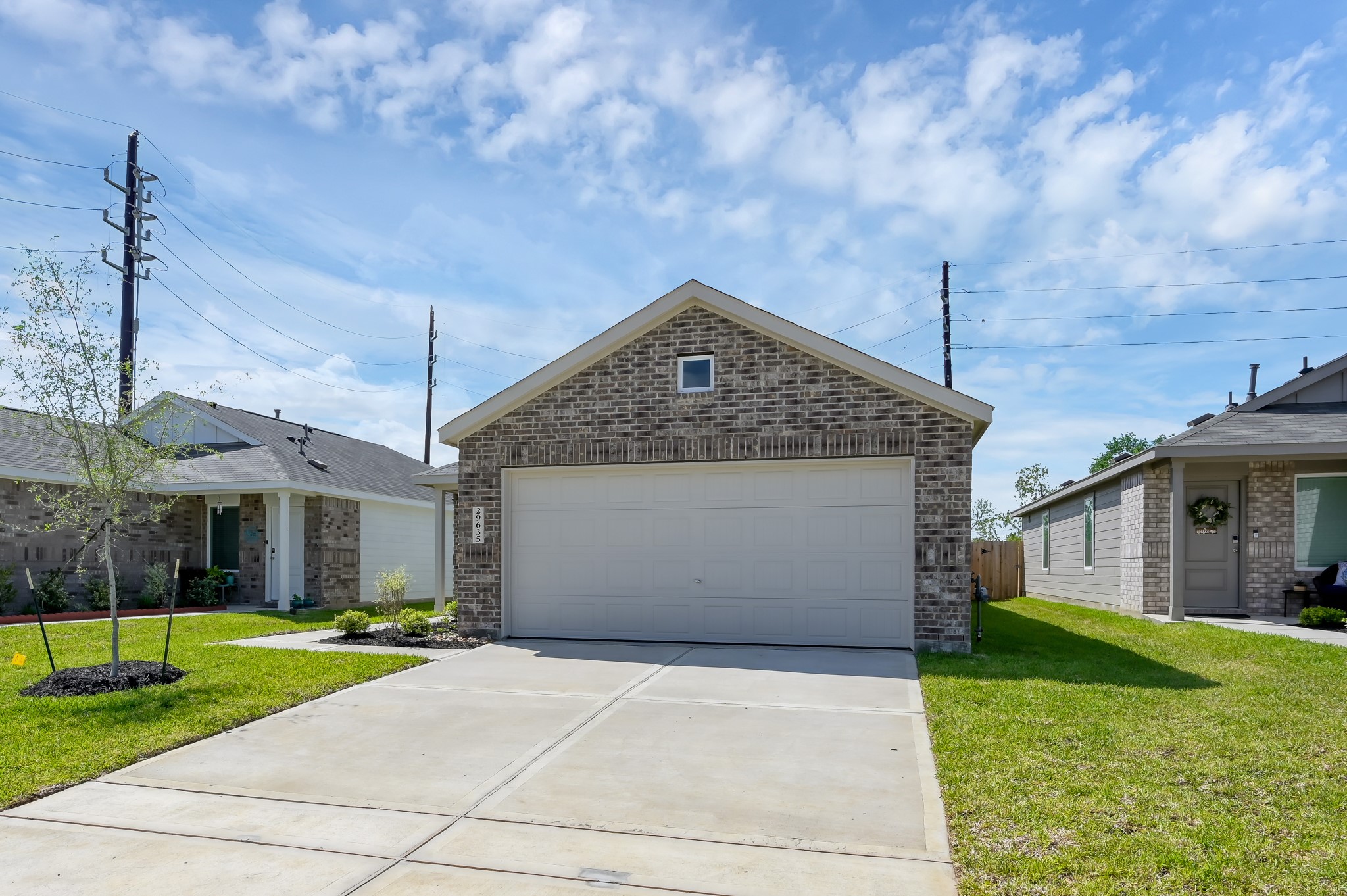 29635 Knollwood Bay Road Waller, TX 77484 - Photo 2 of 39 a front view of a house with yard
