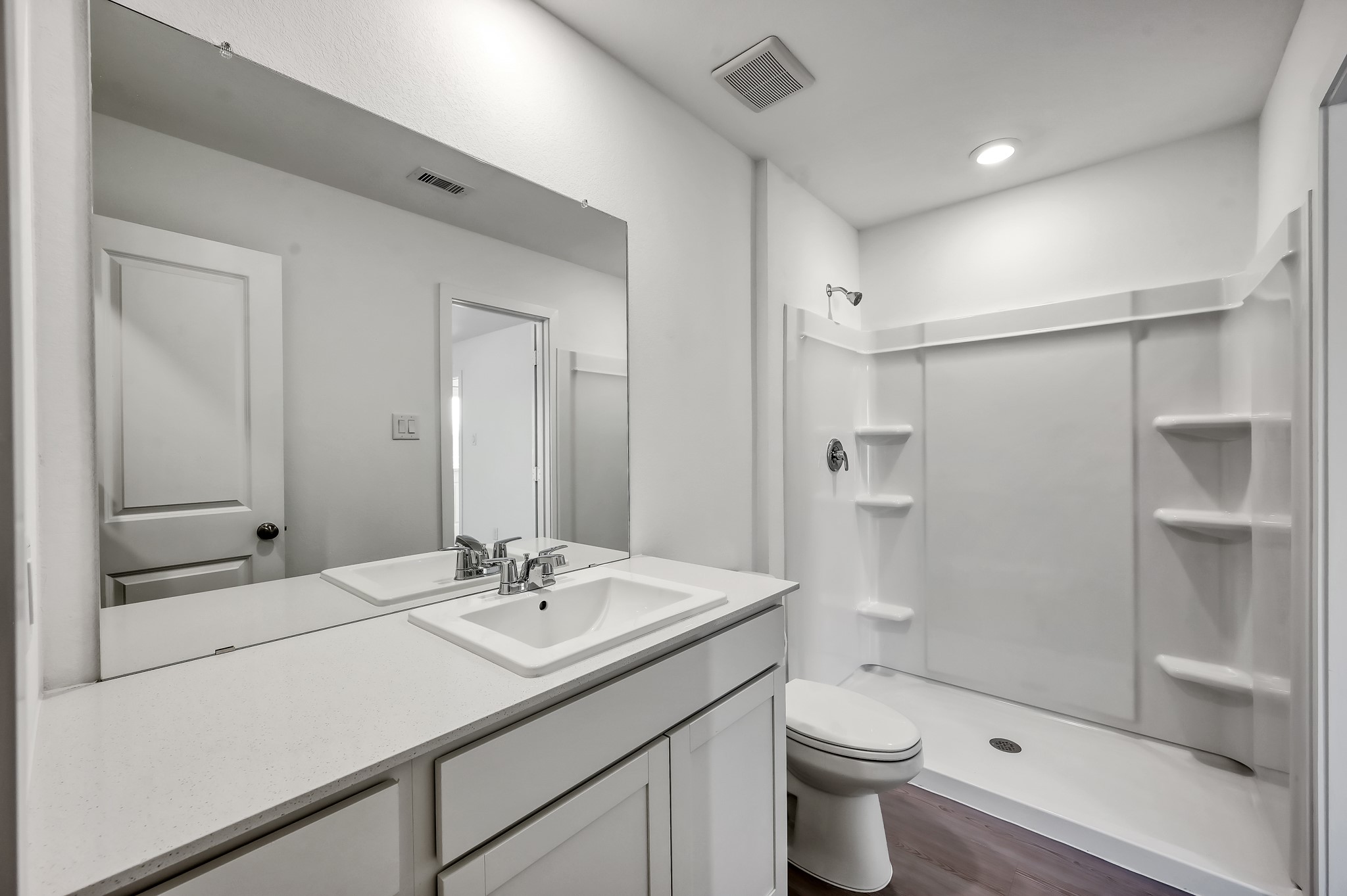 29635 Knollwood Bay Road Waller, TX 77484 - Photo 25 of 39 a bathroom with a sink a toilet and shower