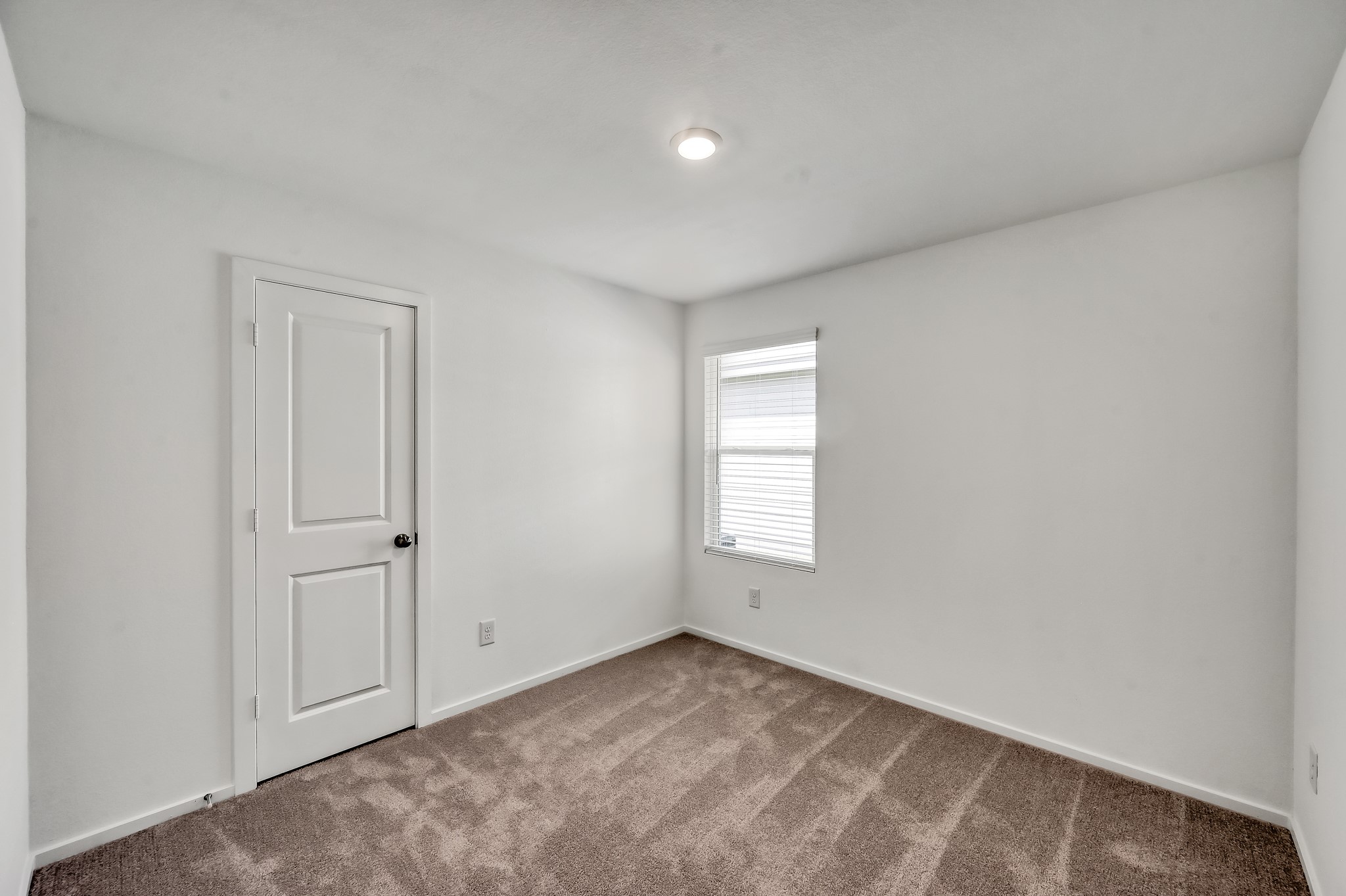 29635 Knollwood Bay Road Waller, TX 77484 - Photo 27 of 39 a view of empty room with window