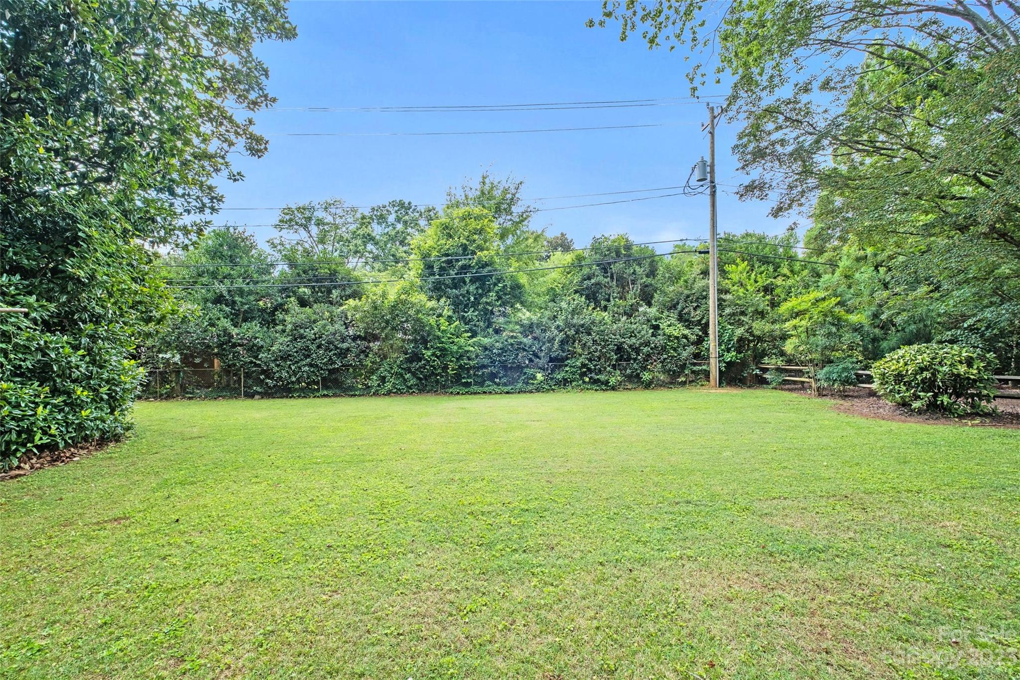 1836 Harris Road Charlotte, NC 28211 - Photo 13 of 33 a view of a field with an outdoor space