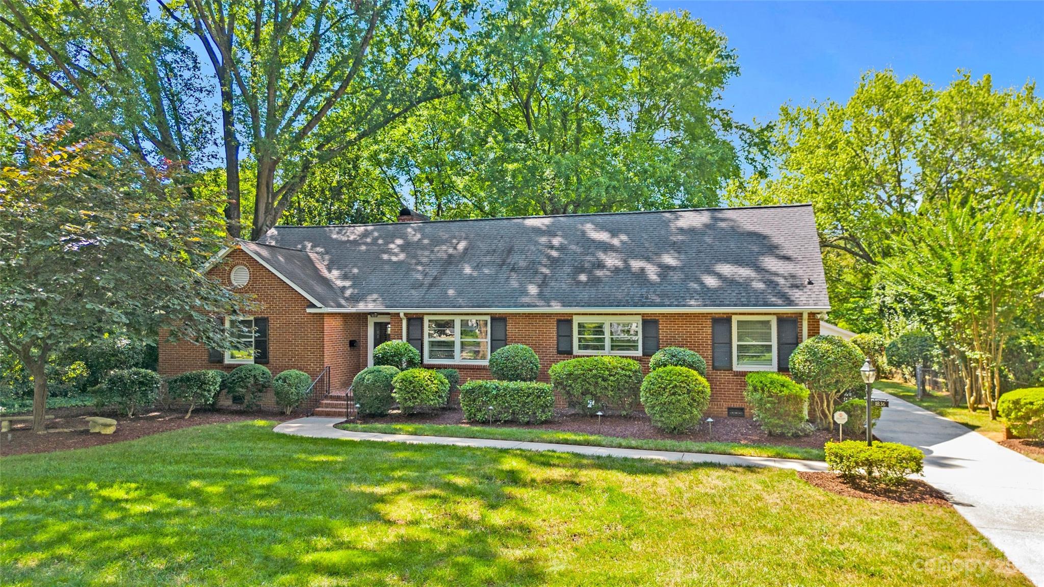 1836 Harris Road Charlotte, NC 28211 - Photo 19 of 33 front view of a house with a yard