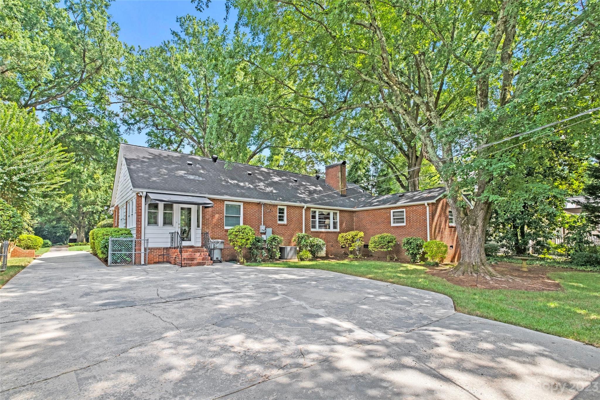 1836 Harris Road Charlotte, NC 28211 - Photo 10 of 33 a view of a house with a yard