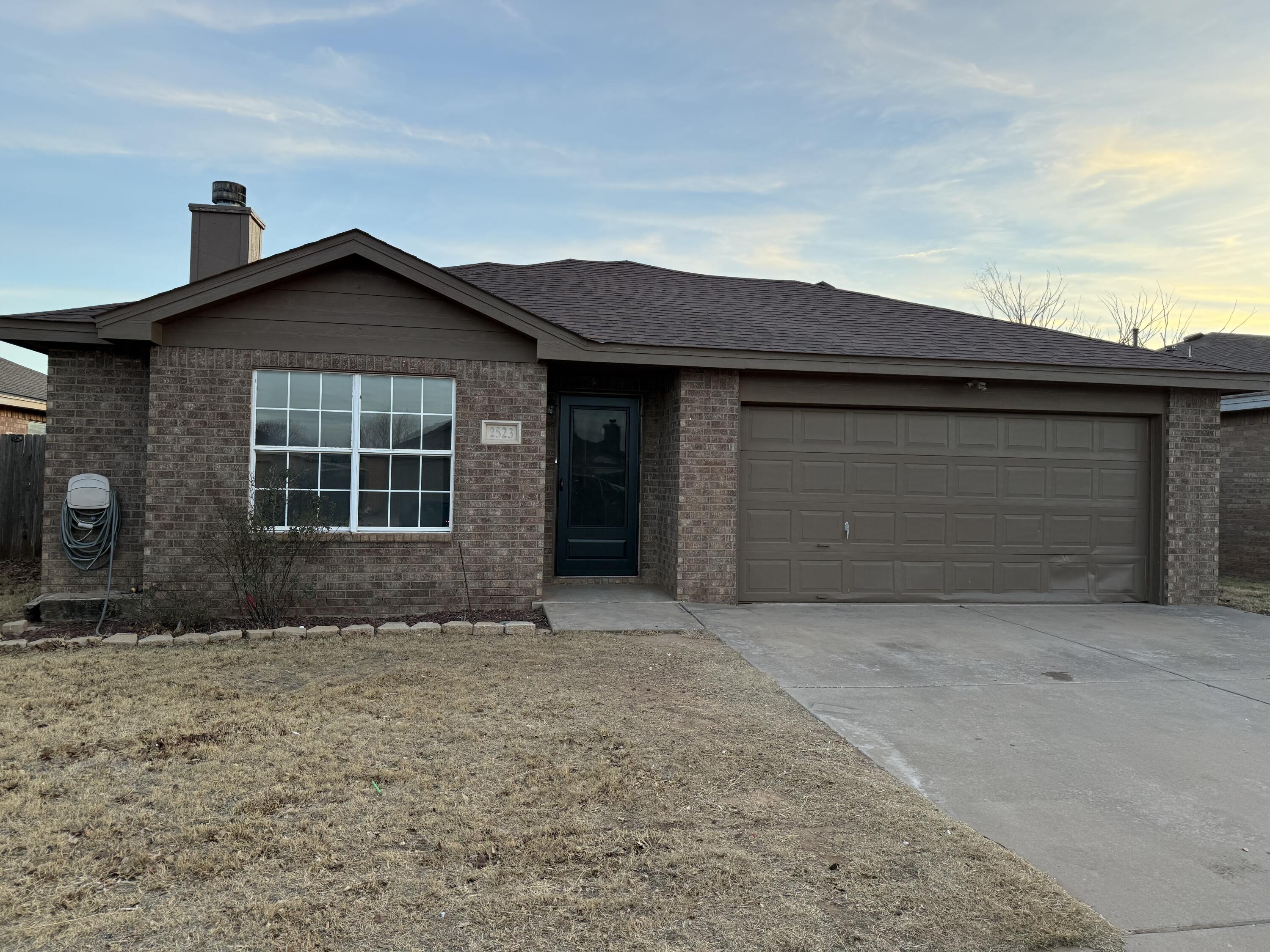 2523 110th Street Lubbock, TX 79423 - Photo 2 of 23 a front view of a house