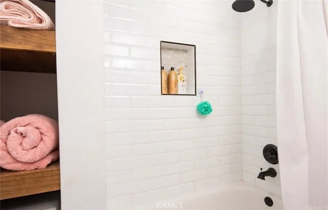 a view of living room kitchen and dining room