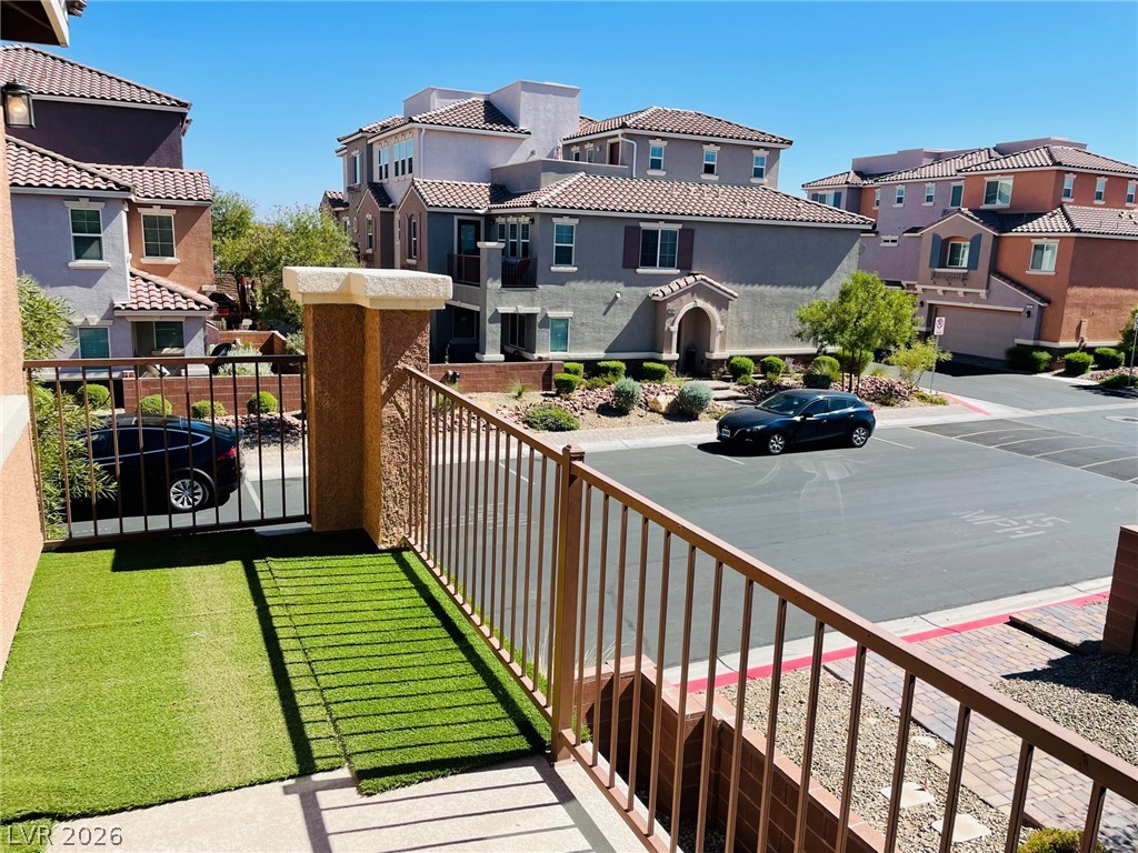 9921 Sable Point Street Las Vegas, NV 89178 - Photo 34 of 43 A private balcony offers elevated neighborhood views.