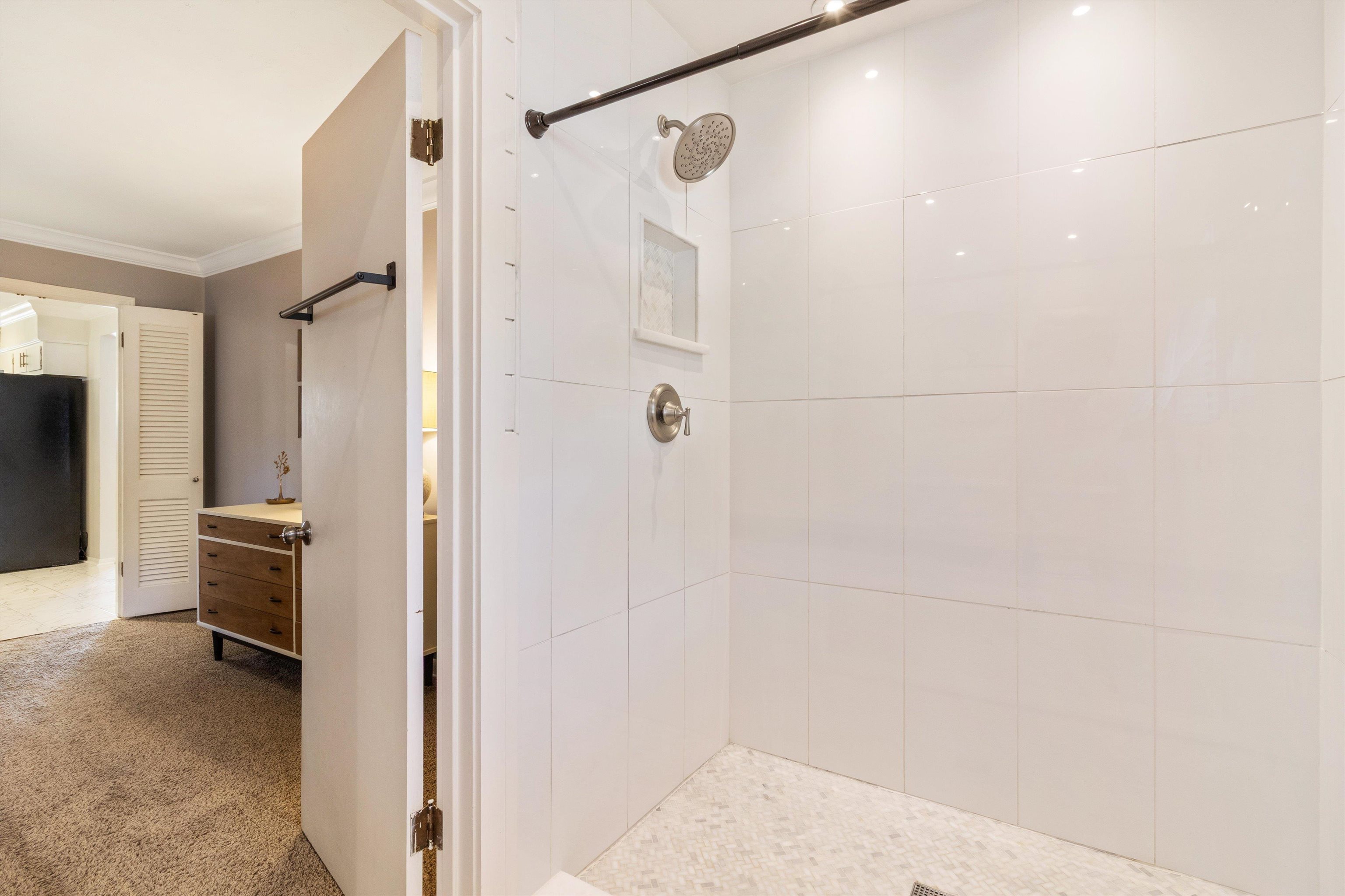 5022 Sea Isle Road Memphis, TN 38117 - Photo 20 of 28 a bathroom with a shower and a glass door