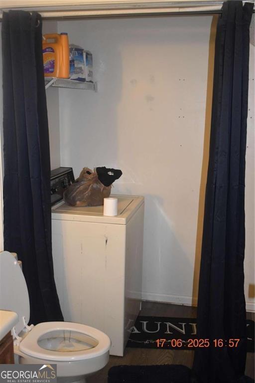 4433 Azalea Drive Macon, GA 31210 - Photo 17 of 24 a bathroom with a toilet and a sink