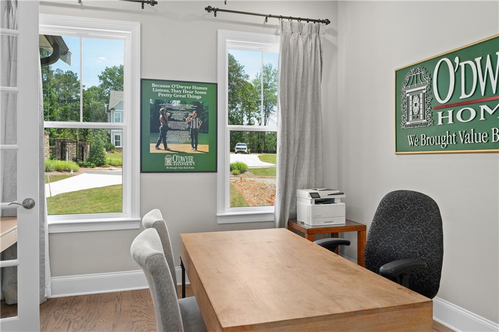 3710 Reserve Overlook Way Cumming, GA 30041 - Photo 11 of 98 a view of a dining room with furniture window and outside view