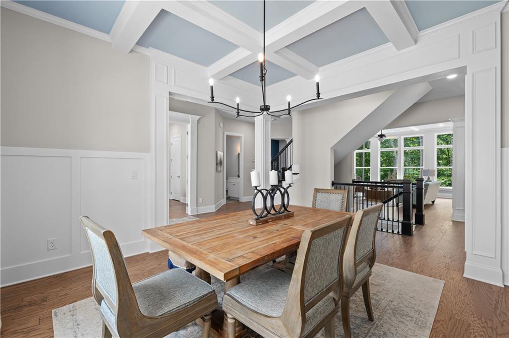 3710 Reserve Overlook Way Cumming, GA 30041 - Photo 17 of 98 a view of a dining room with furniture and wooden floor