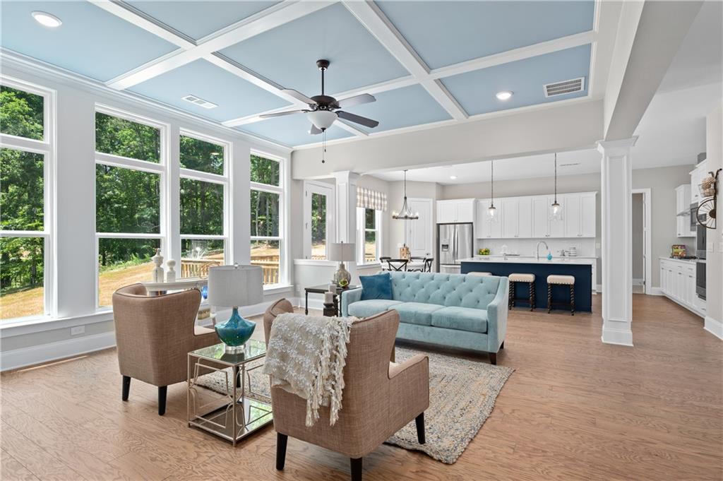 3710 Reserve Overlook Way Cumming, GA 30041 - Photo 22 of 98 a living room with furniture and a large window